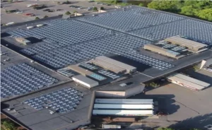 Large solar panel project on flat roof of industrial building