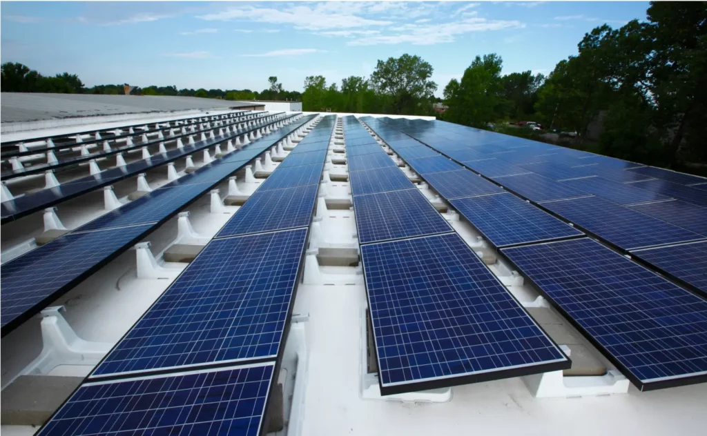 High resolution image of a large, industrial flat-roof solar array